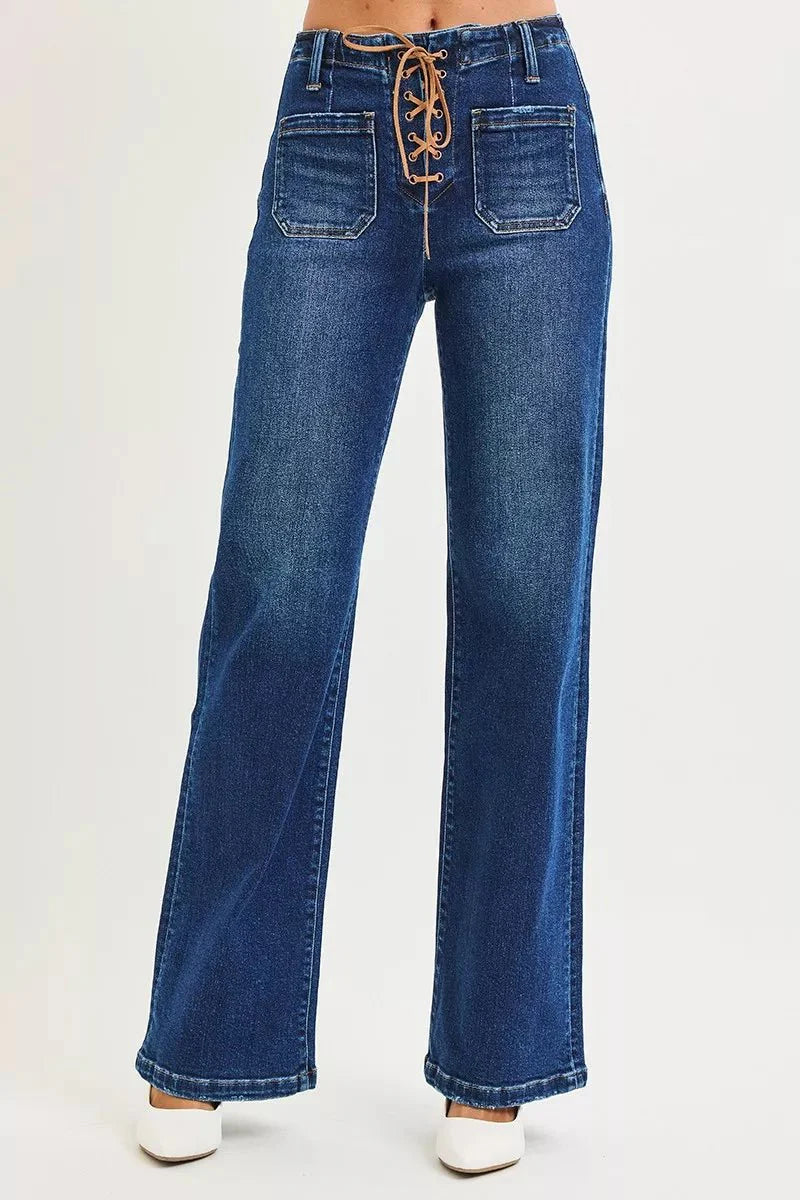Dark wash high-rise wide leg denim pants with front tie waist detail, flattering silhouette