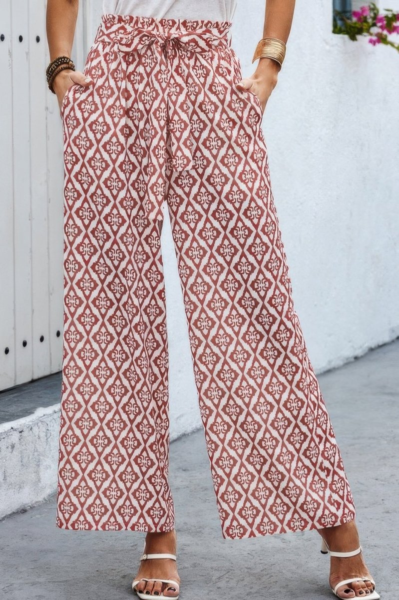 Women's wide leg travel pants with elastic waistband, belt, breathable fabric, and side pockets