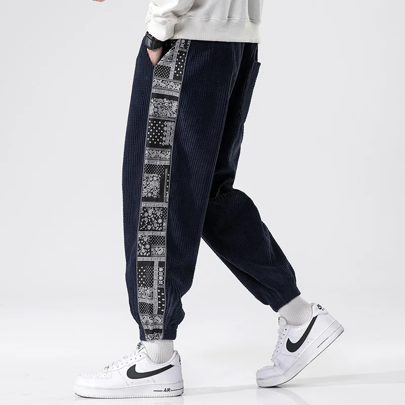 Unisex corduroy jogger pants with bandana patchwork side panels, relaxed fit streetwear