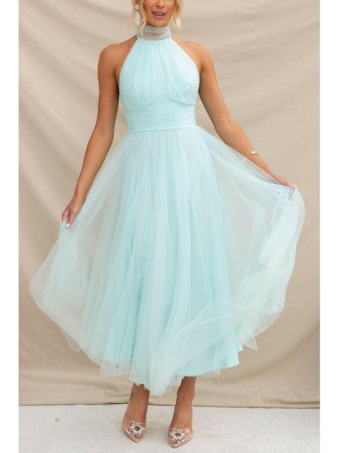 Elegant women's tulle evening gown with delicate overlay and flattering silhouette for formal events