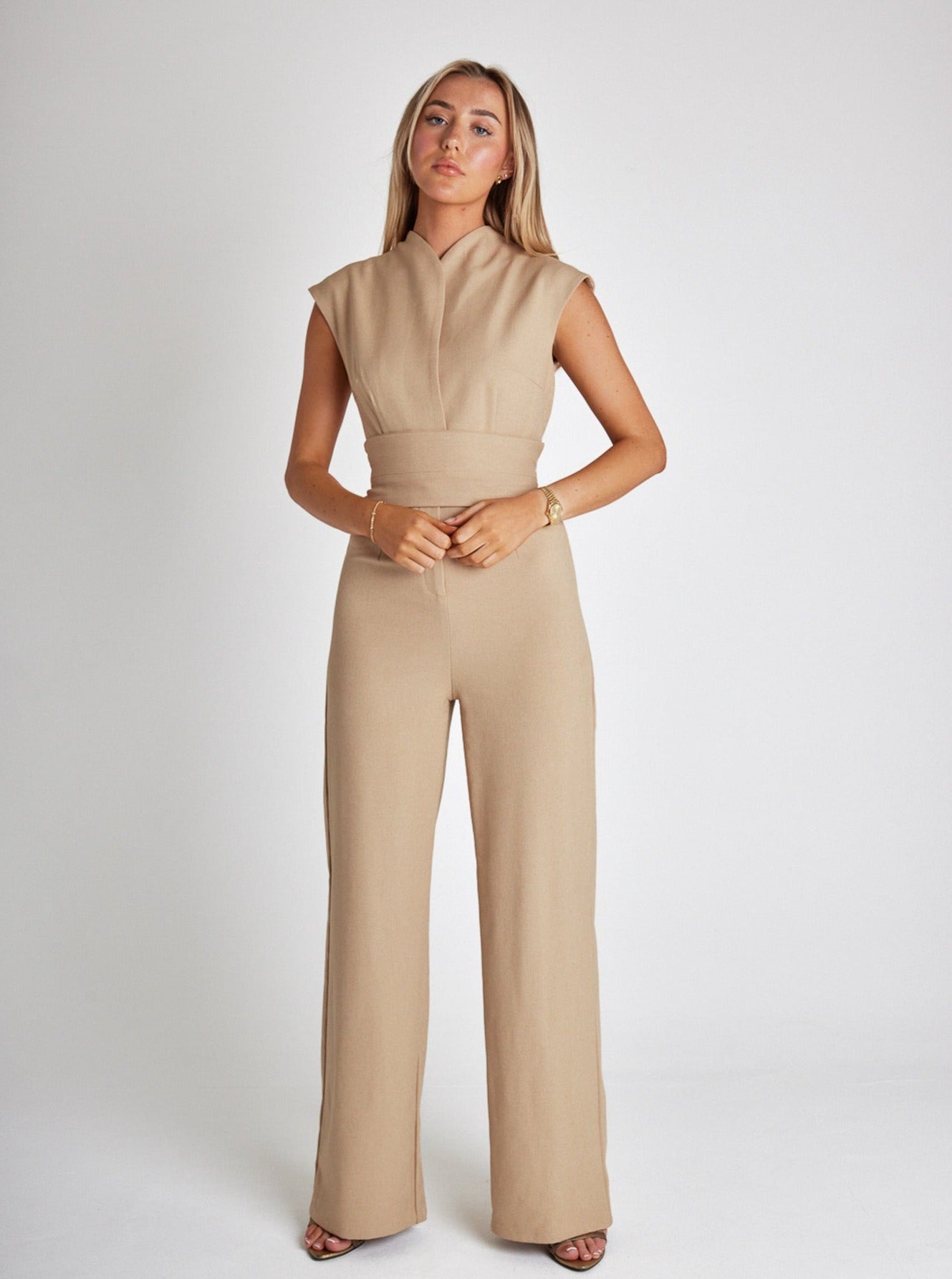Women's sleeveless jumpsuit in elegant silhouette, modern cut with figure-flattering design for any occasion