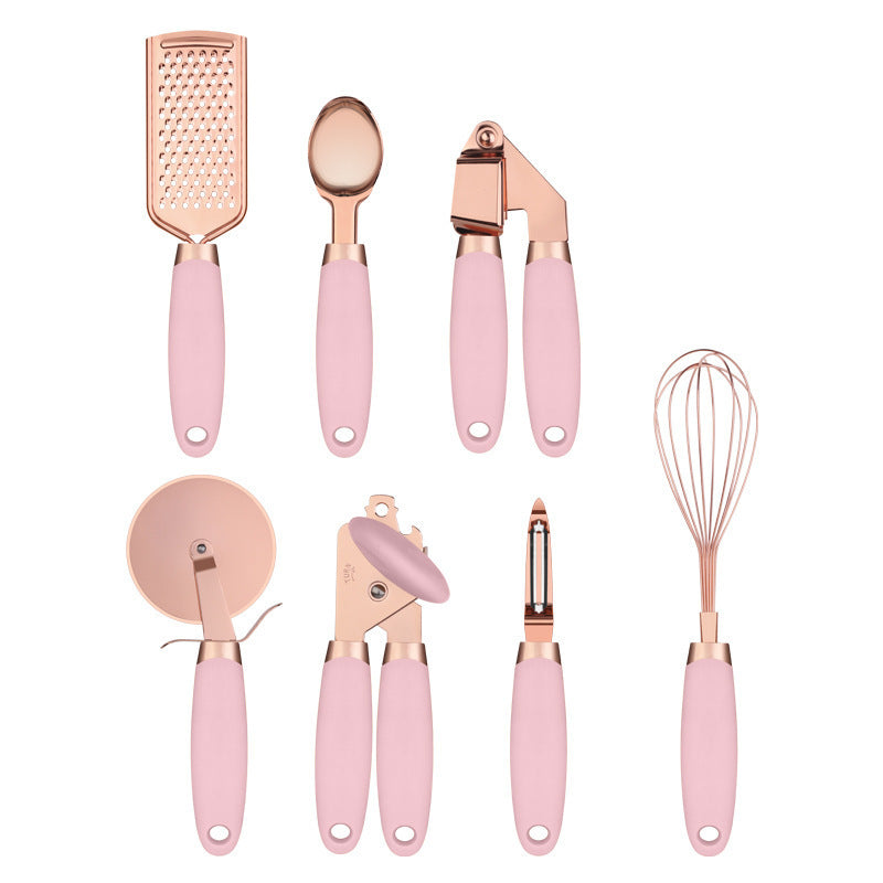 Copper and black 7-piece kitchen utensil set with ergonomic handles for precision home cooking