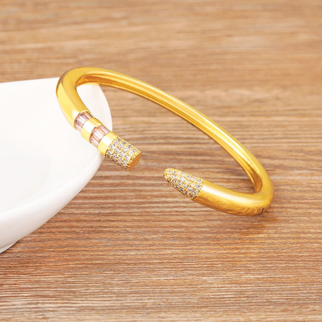 Gold plated pencil cuff bracelet with cubic zirconia inlays adjustable unisex bangle minimalist design