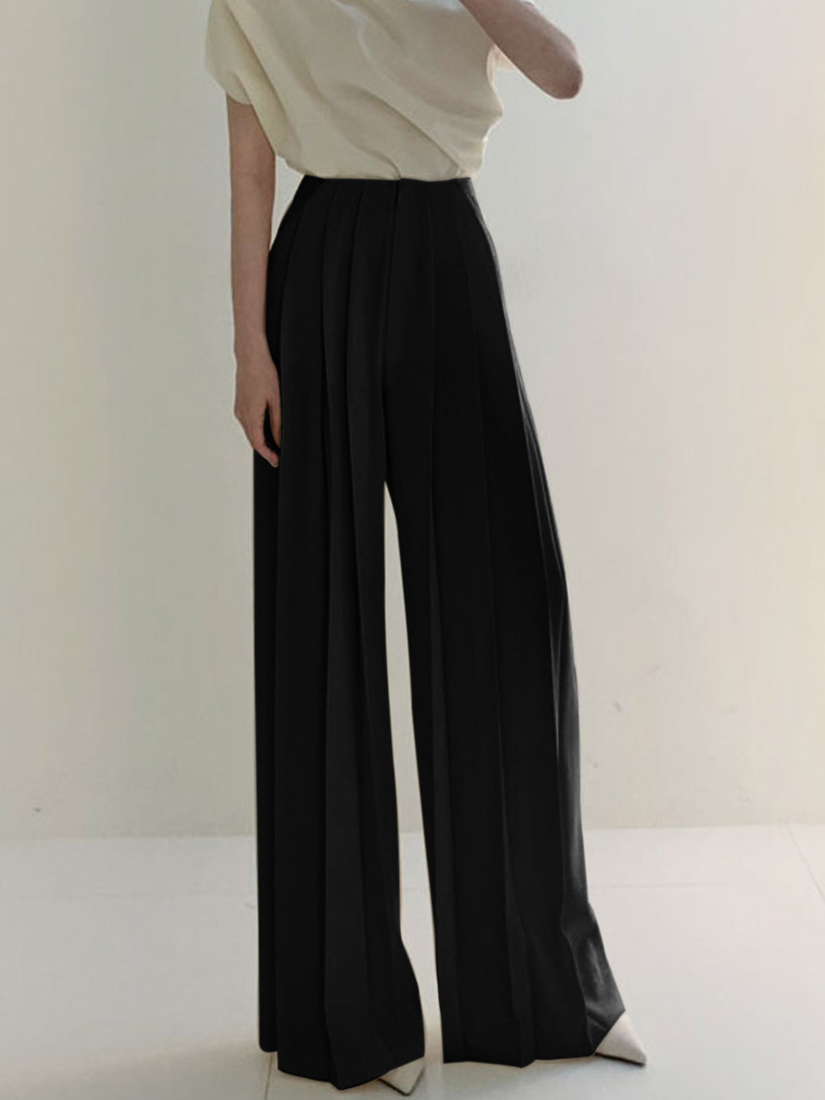 Elegant ivory wide-leg trousers with pleated high waist, woven fabric perfect for work and special occasions