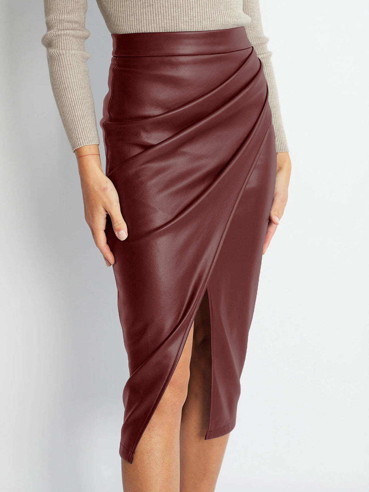 Black pleated PU leather midi skirt with front split, sleek vegan finish for office to evening