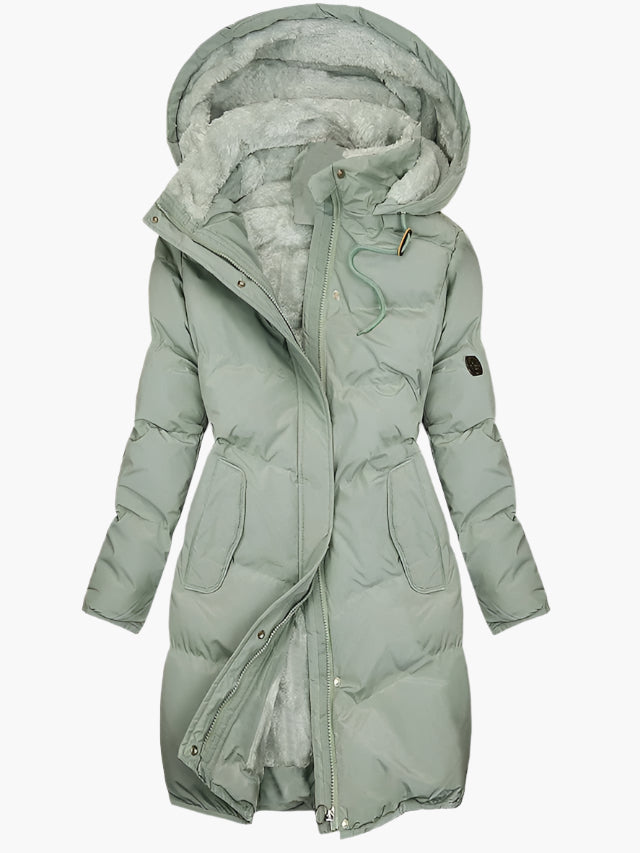 Women's long hooded puffer coat with faux fur liner, versatile winter style for cold weather