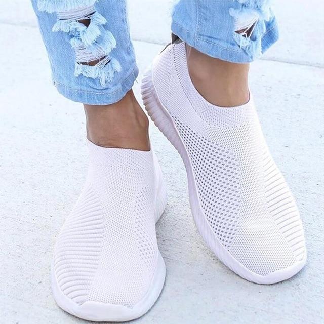 Women's slip-on orthopedic sneakers with padded sole, natural foot alignment support, and laceless comfort design