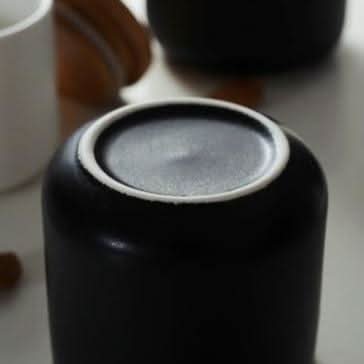 Matte white ceramic kitchen canister with natural bamboo airtight lid, minimalist design for home chefs