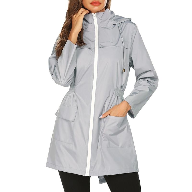 Women's slim-fit lightweight rain jacket with adjustable waist, sleek modern silhouette for all-weather wear