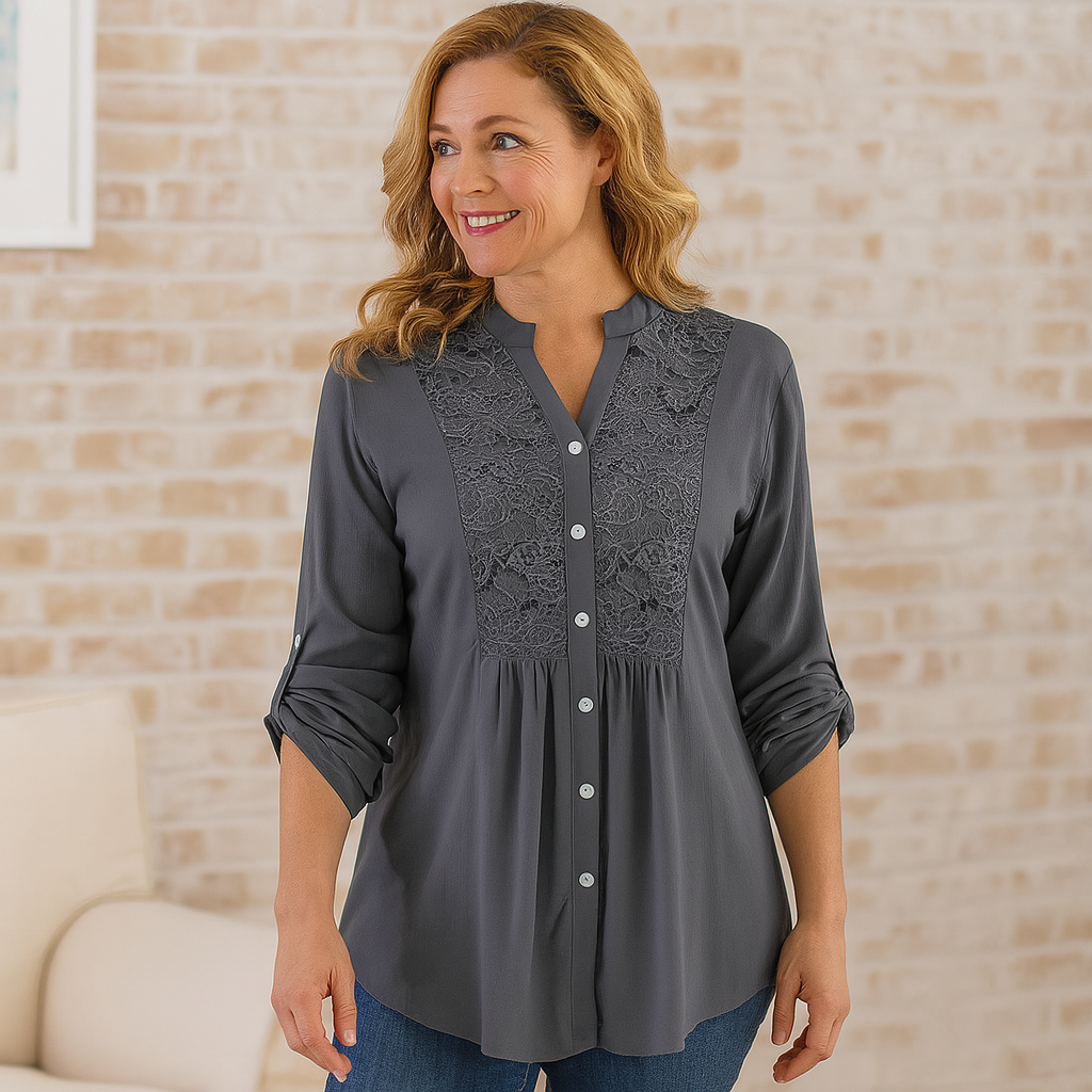 Women's white cotton long blouse with delicate lace embroidery detail and flattering V-neckline