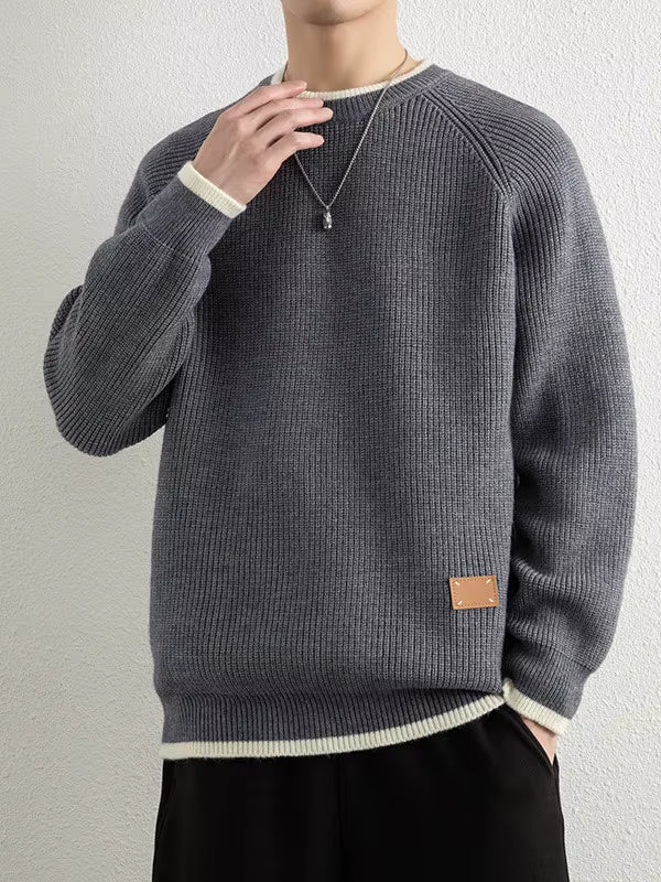 Men's heavyweight ribbed knit crewneck sweater in neutral tone with tailored seams and cotton blend