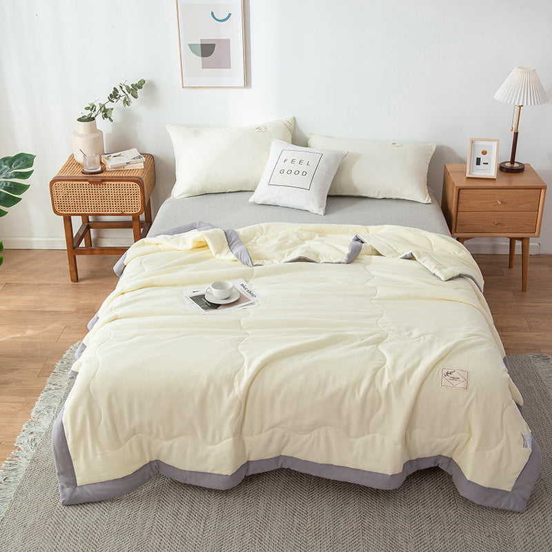 Lightweight white minimalist cotton quilt with geometric stitched pattern, breathable design for hot sleepers