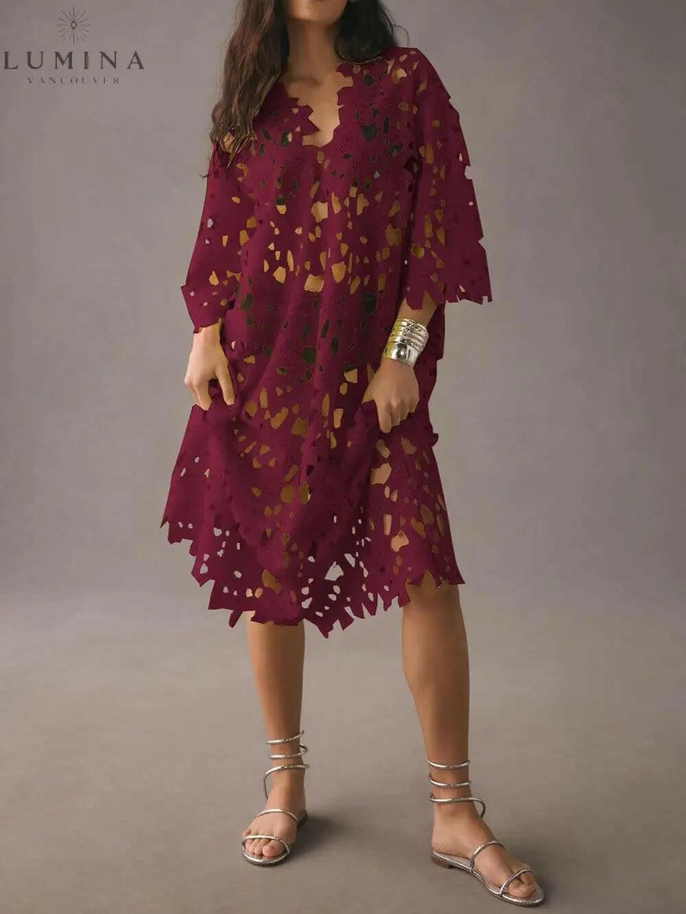 Raquel white floral eyelet long sleeve midi dress with delicate cutwork pattern for garden parties
