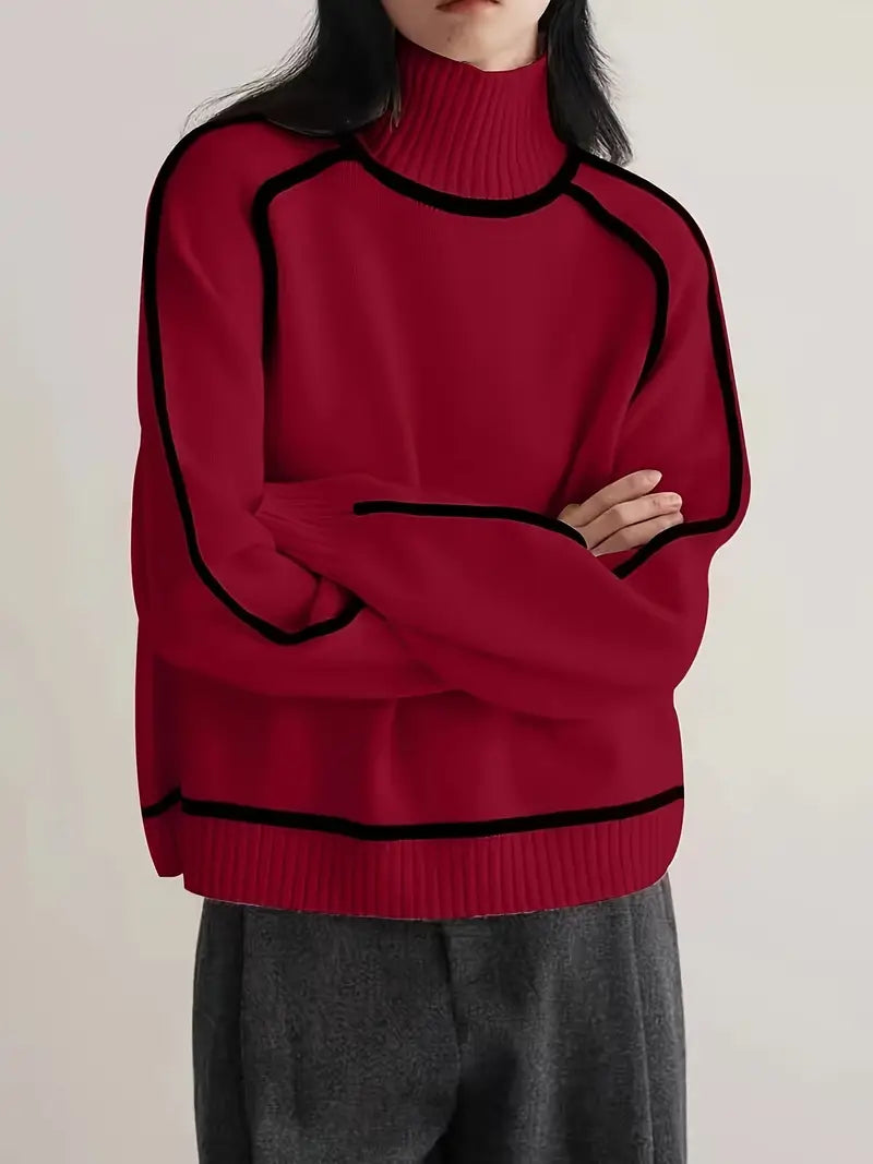 Beige turtleneck knit sweater with black contrast trim seams, sleek architectural cut for professionals