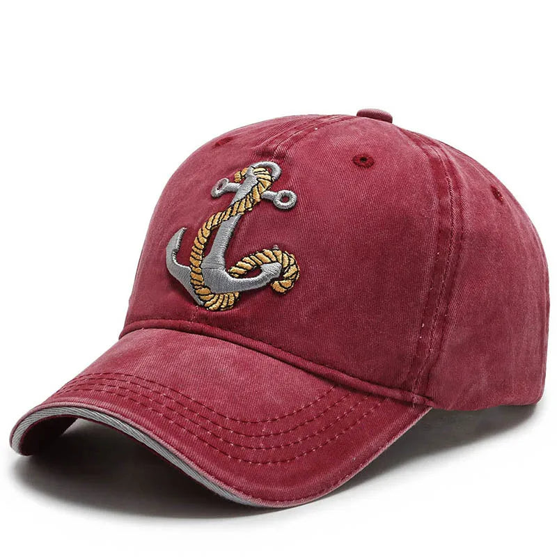 Washed cotton baseball cap with embroidered anchor patch, adjustable metal buckle, vintage rugged style