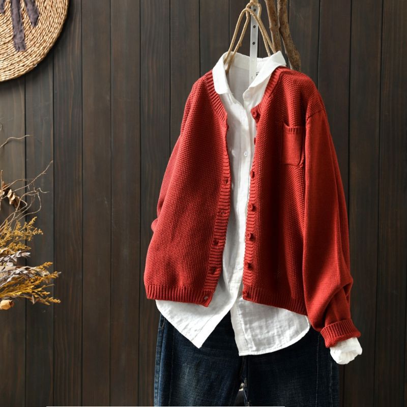 Women's relaxed-fit cozy knit cardigan with button detail, timeless layering essential for everyday style