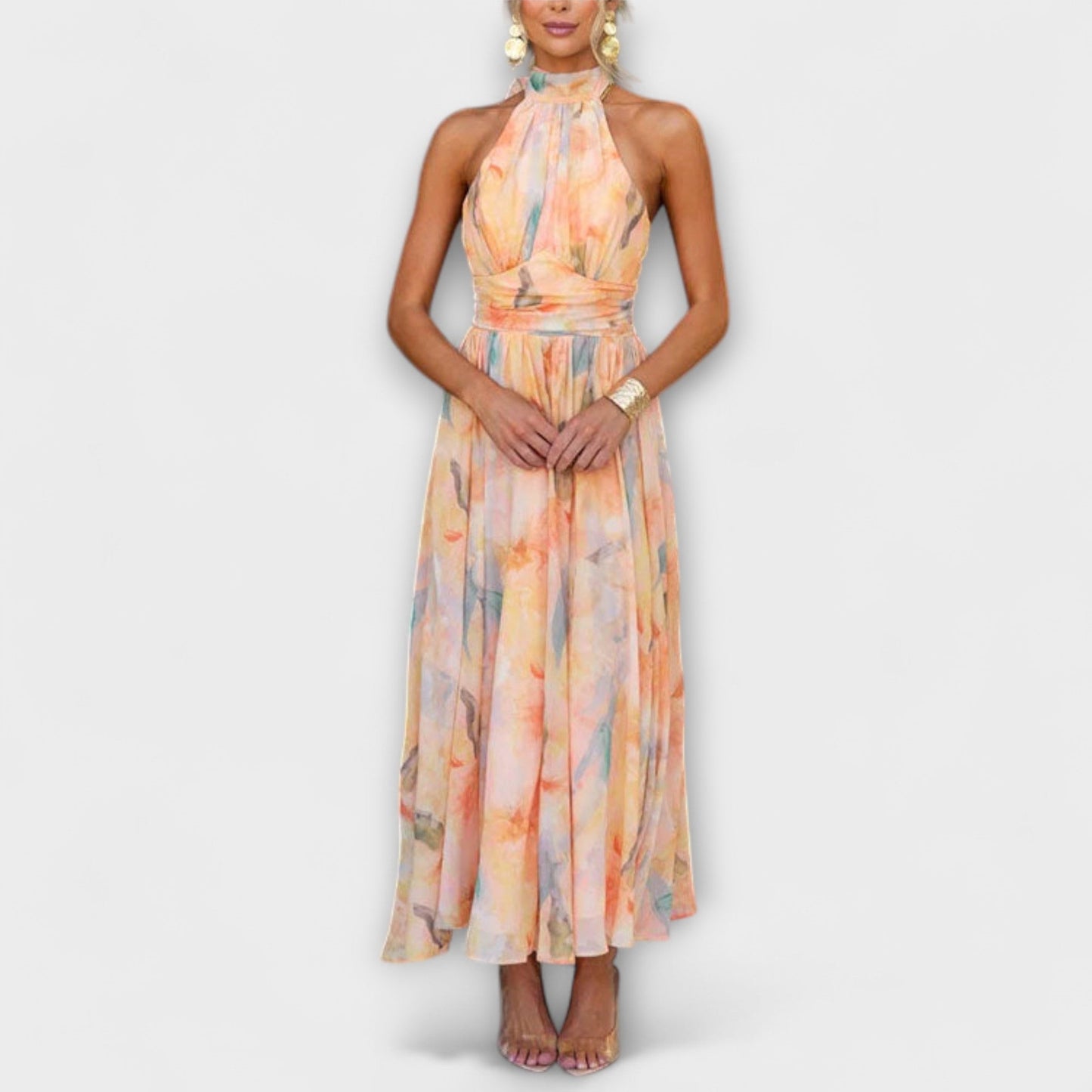 Black halter maxi gown with cinched waist, flowing silhouette, and elegant halter neckline for formal evenings