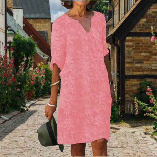 Women's casual floral midi dress with flattering V-neckline, relaxed short sleeves, effortless daywear style