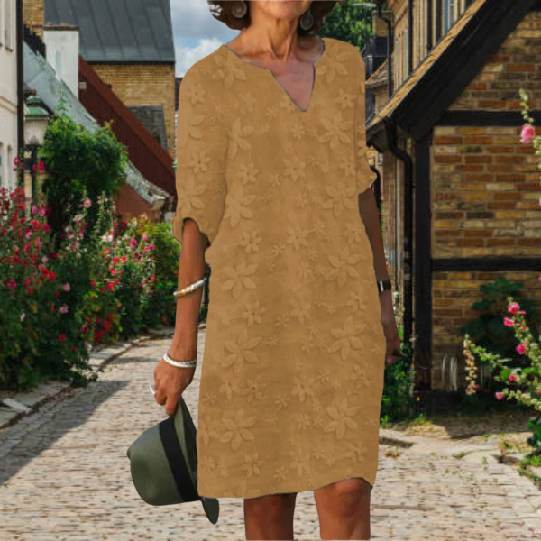 Women's casual floral midi dress with flattering V-neckline, relaxed short sleeves, effortless daywear style