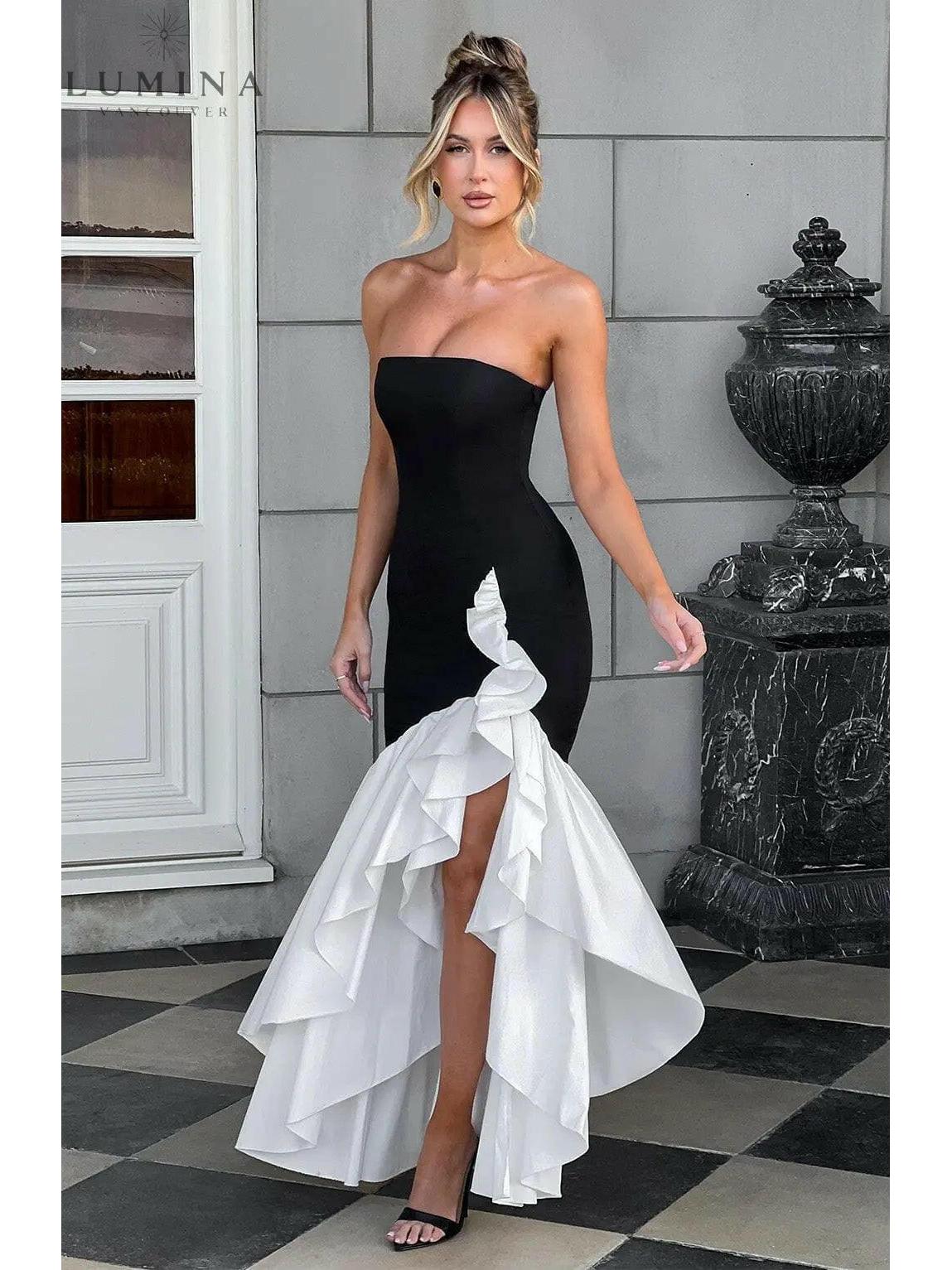 Elegant sleeveless ruffle maxi dress with flowing silhouette and daring side slit for women