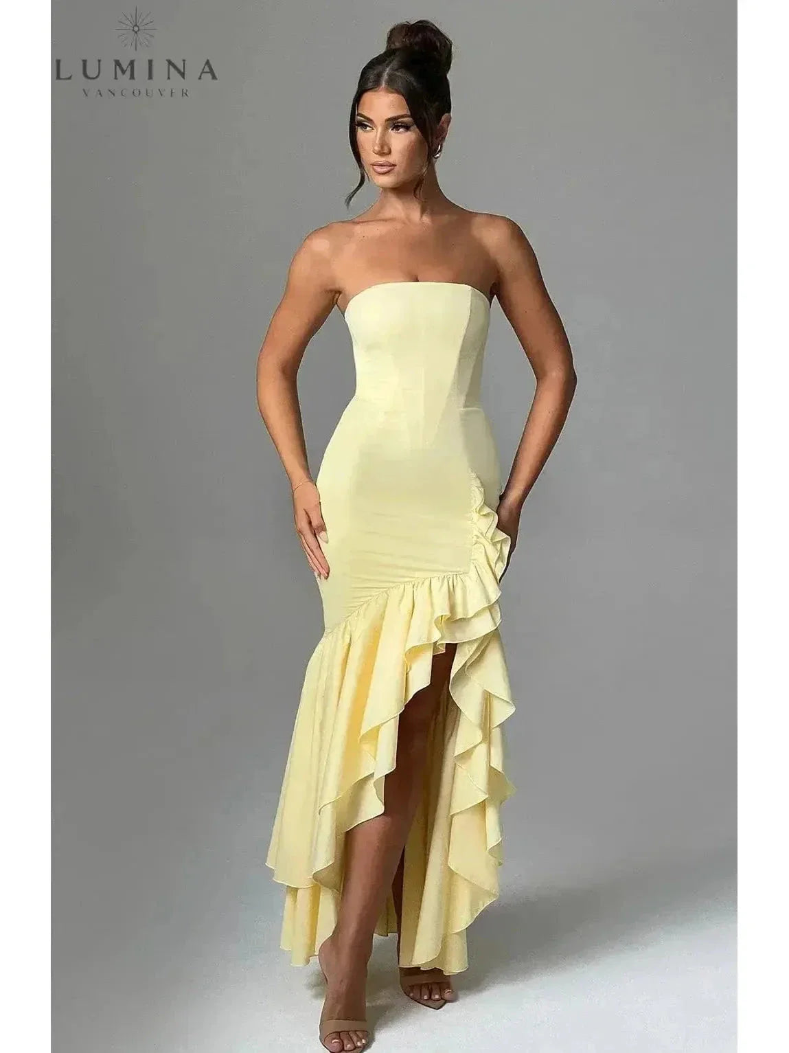 Sleeveless ruffle maxi dress elegant flowing silhouette with daring side slit for women