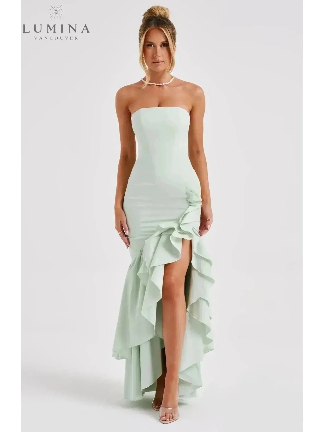 Elegant sleeveless ruffle maxi dress with flowing silhouette and daring side slit for women