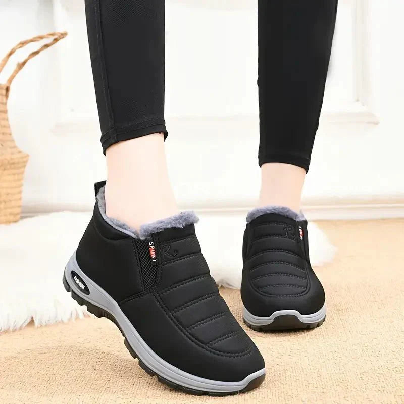 Women's black ankle boots warm-lined water-repellent non-slip winter comfort boots with sleek silhouette