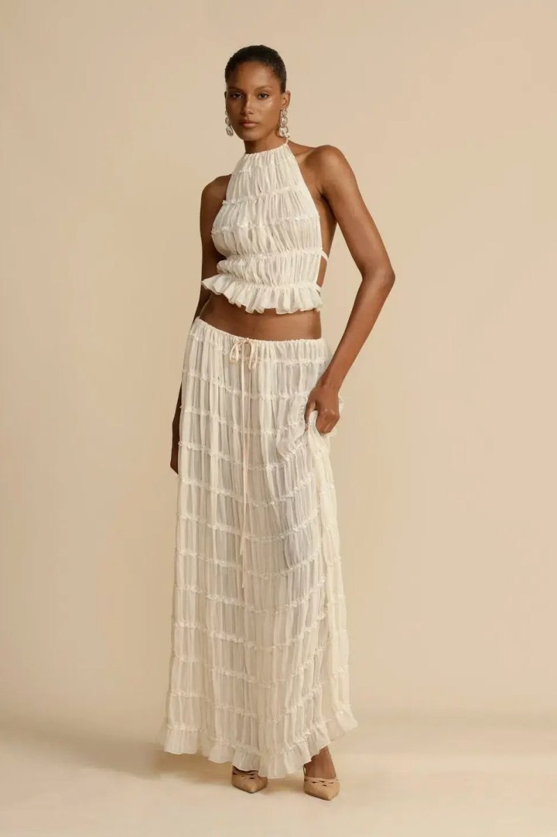Women's pleated two-piece summer set lightweight blouse and flowing pants elegant feminine silhouette