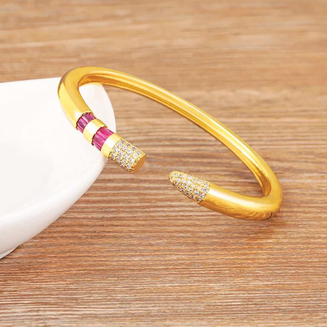 Gold plated pencil cuff bracelet with cubic zirconia inlays adjustable unisex bangle minimalist design