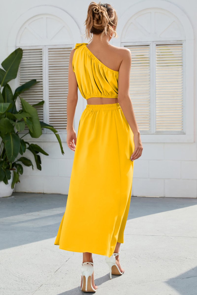 Ruched one-shoulder top and high-slit skirt two-piece set bold asymmetrical evening silhouette