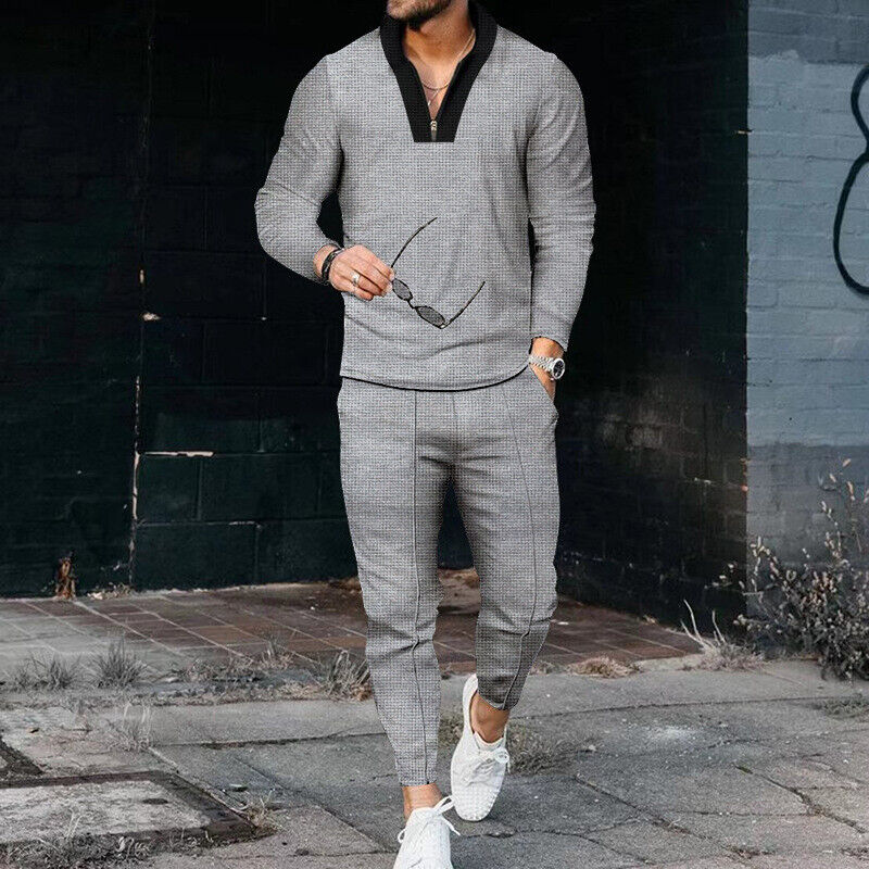 Men's casual two-piece zip top and trouser set in a coordinated colorway with long sleeves