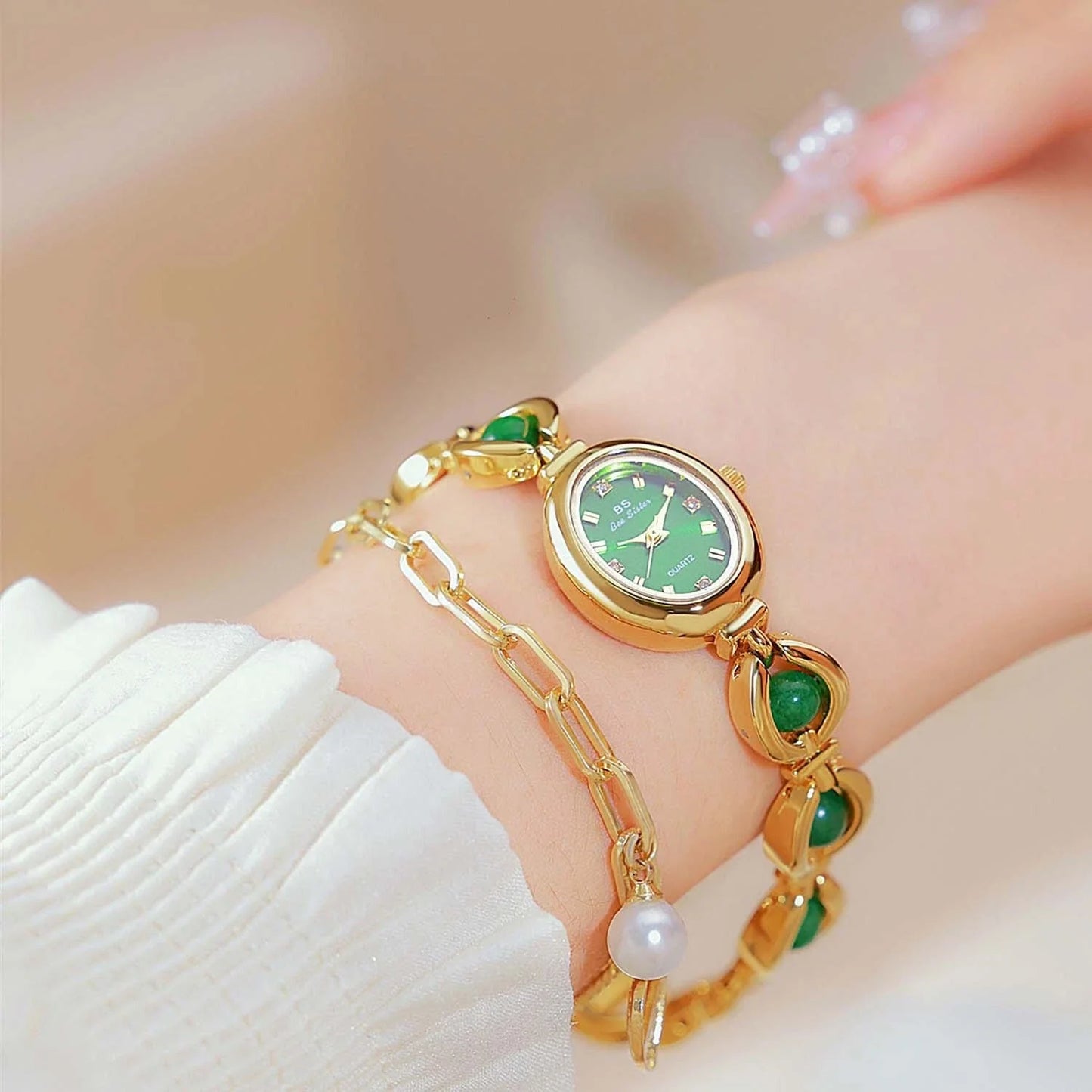 Lyra women's quartz watch pearl-link bracelet natural fritillaria dial crystal markers elegant