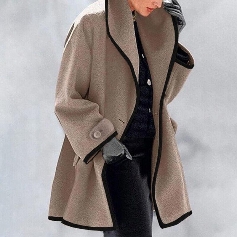 Women's oversized camel coat wide lapel contrast trim relaxed silhouette timeless winter essential