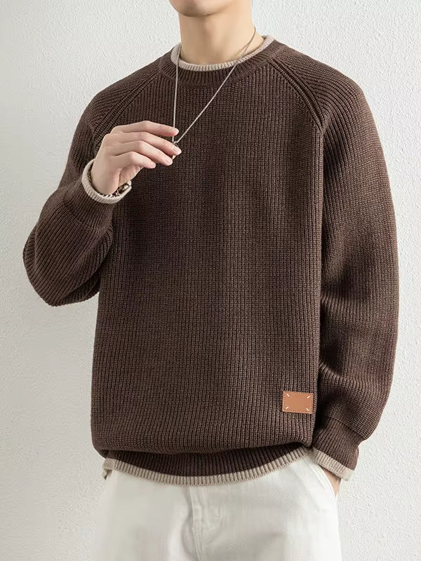 Men's heavyweight ribbed knit crewneck sweater in neutral tone with tailored seams and cotton blend