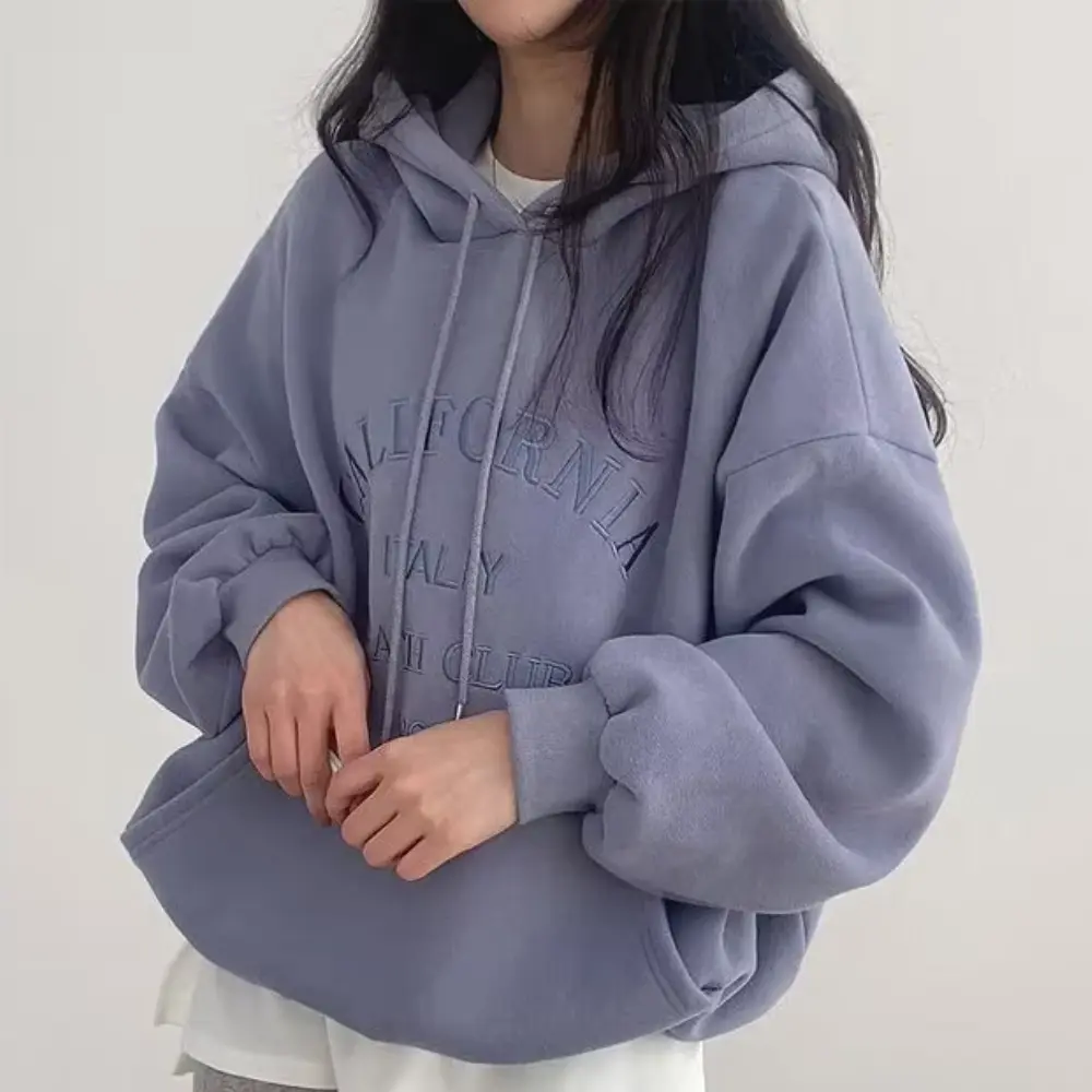 Women's fleece-lined hoodie loose fit chic layering essential cozy warm casual style