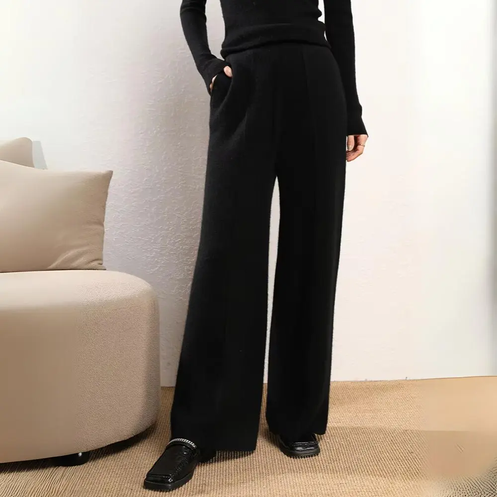 Neutral wide-leg knitted trousers wool cashmere blend soft draped silhouette cozy office style