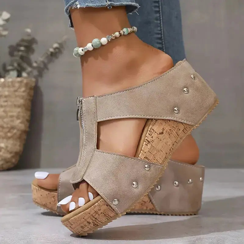 Beige orthopedic wedge sandals with cushioned arch support and lightweight cork sole for all-day comfort
