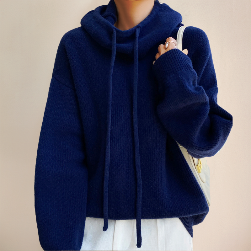 Women's oversized wool hoodie in neutral tone, relaxed fit with draped cowl neck for cozy chic style