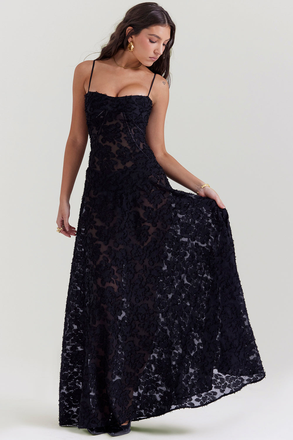 Women's slim-fit maxi dress with floral appliqué and lace back detail, elegant party style