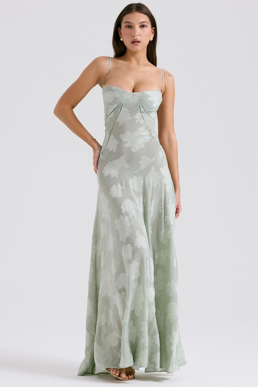 Soft pink lamé vintage evening gown with floral pattern, layered fabric, and built-in cups for glamorous wear