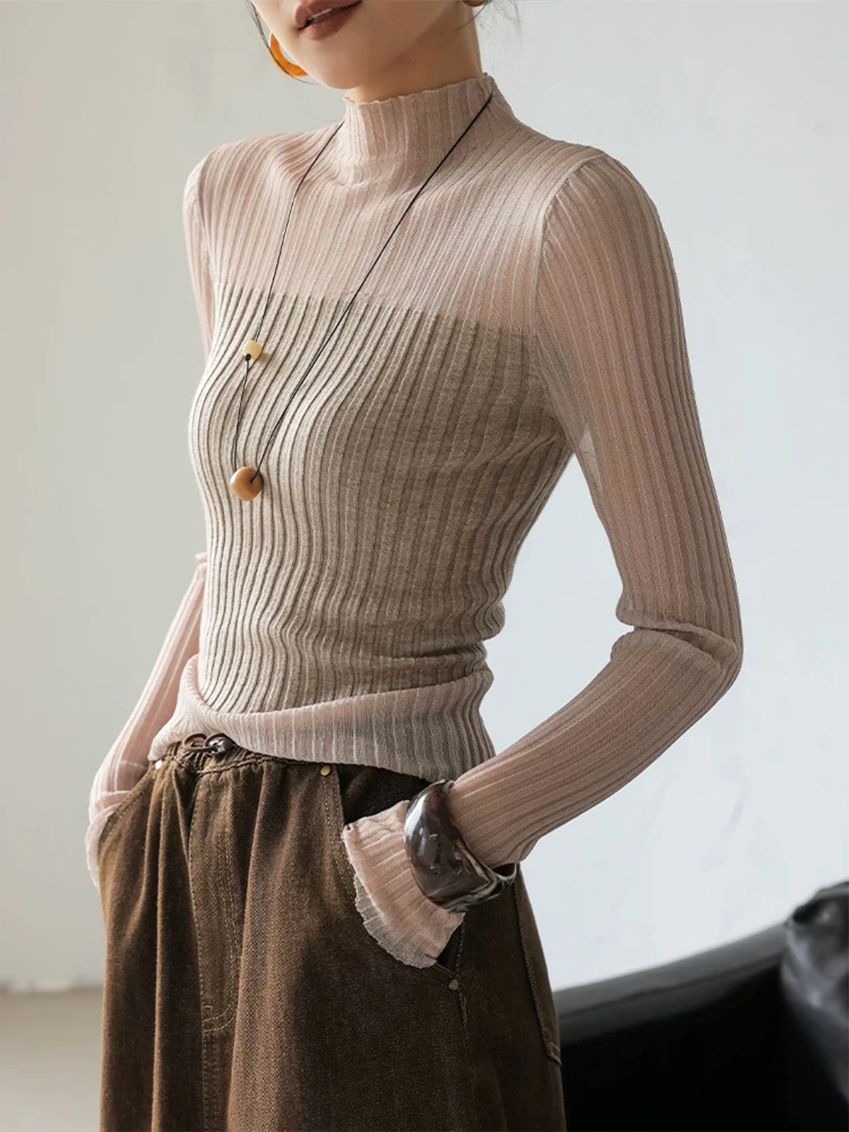 Women's beige slim rib-knit sweater with sheer panel accents for casual chic layering