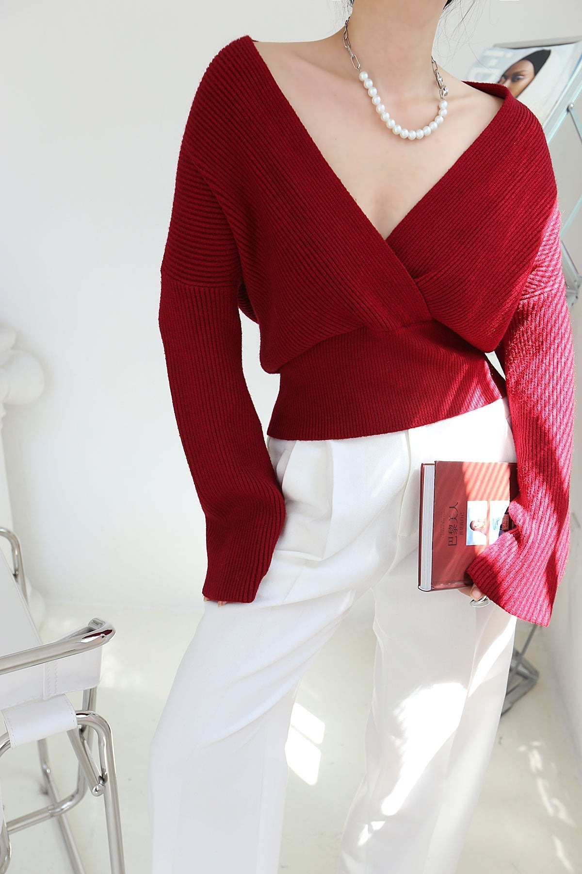 Women's wrap sweater neutral knit casual workwear style with slight stretch and effortless silhouette