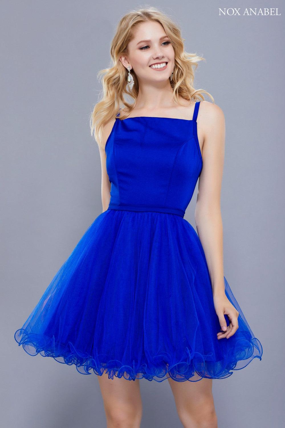 Short black tulle prom dress with spaghetti straps, open back, and flirty mini skirt for teens