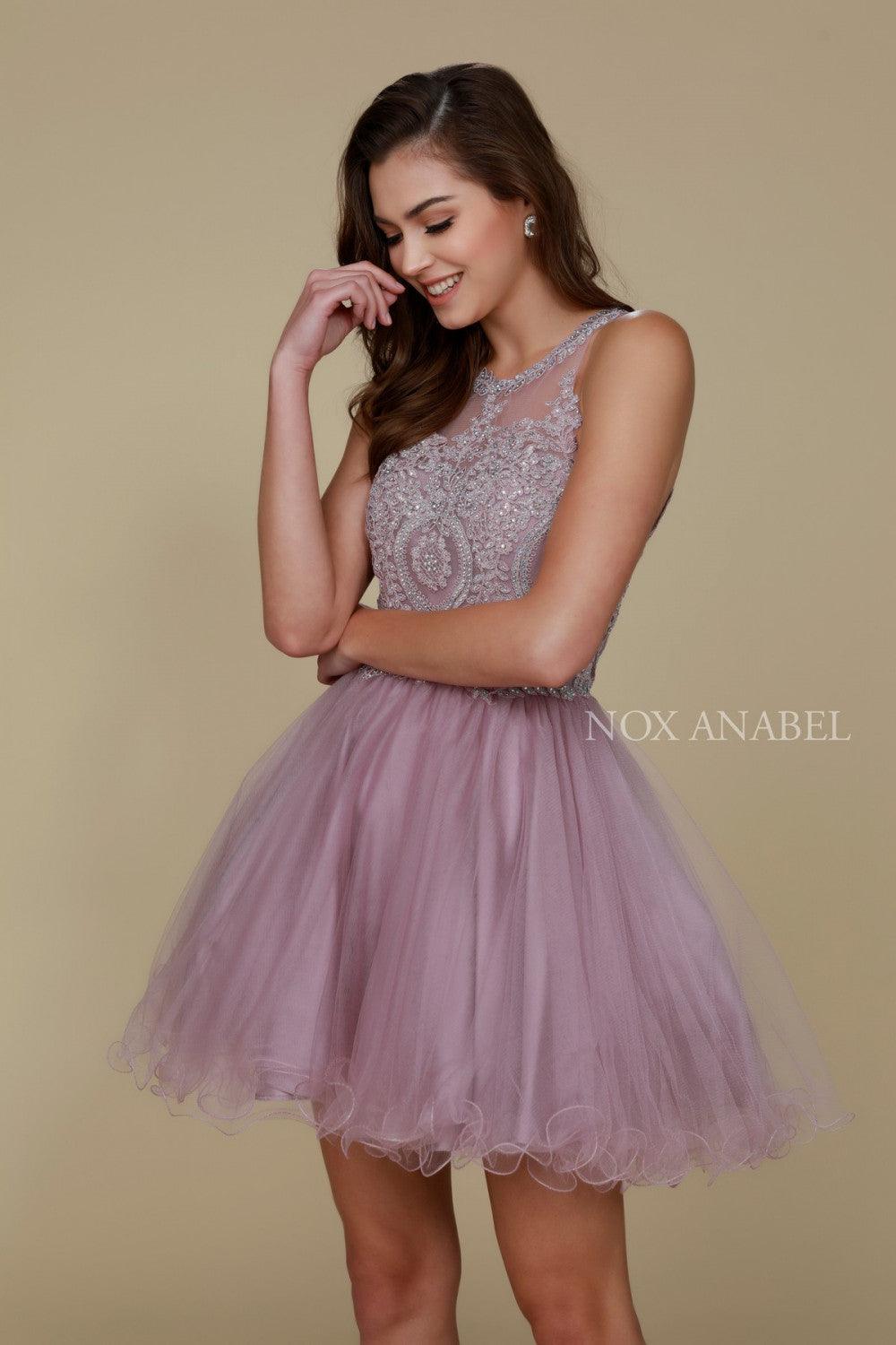 Sleeveless ivory tulle A-line homecoming dress with lace appliques, rhinestones, and open back