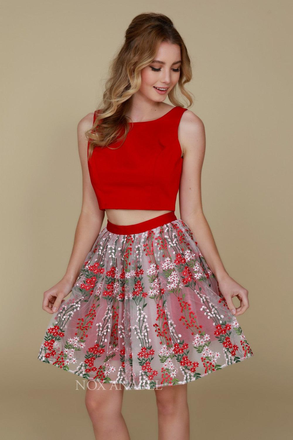Red floral two-piece homecoming dress with open-back crop top and sheer embroidered skirt