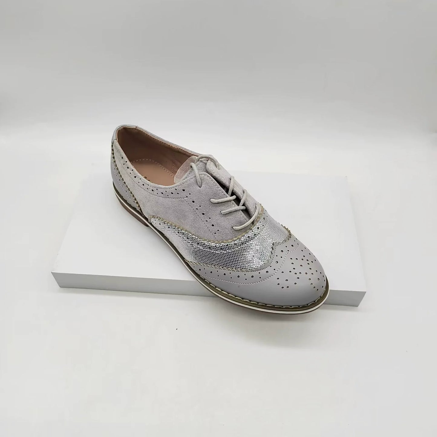 Women's brown faux leather lace-up brogue shoes with classic perforated detailing for everyday comfort