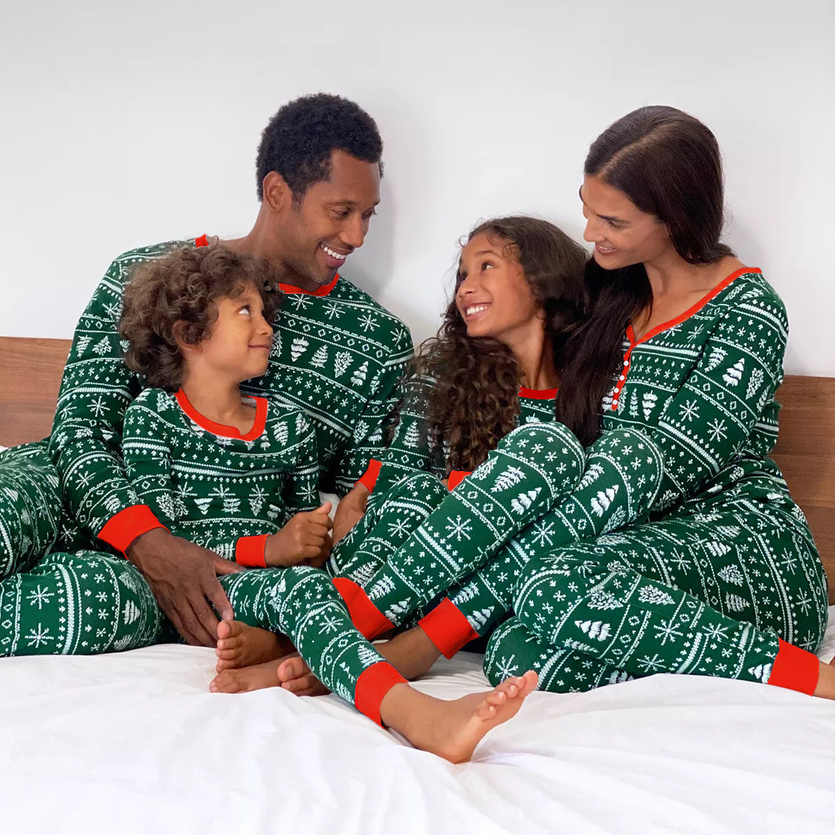Green snowflake print family matching Christmas pajamas set coordinated holiday sleepwear for parents and kids