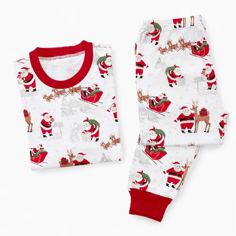 Red Christmas matching family pajama set with festive printed designs for parents and kids cozy nights