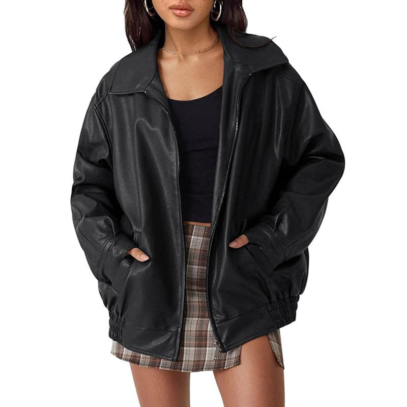 Women's black genuine leather biker jacket with moto-style cut and zipper pockets
