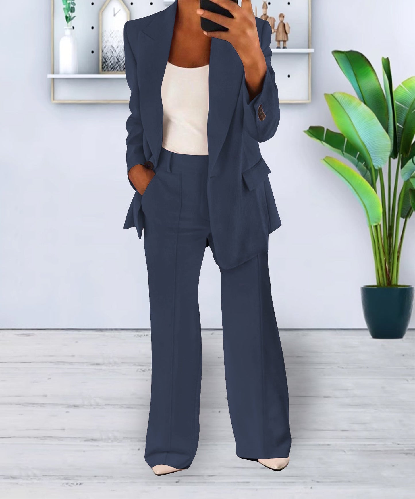 Navy blue women's slim-fit business blazer with button front closure for office professionals